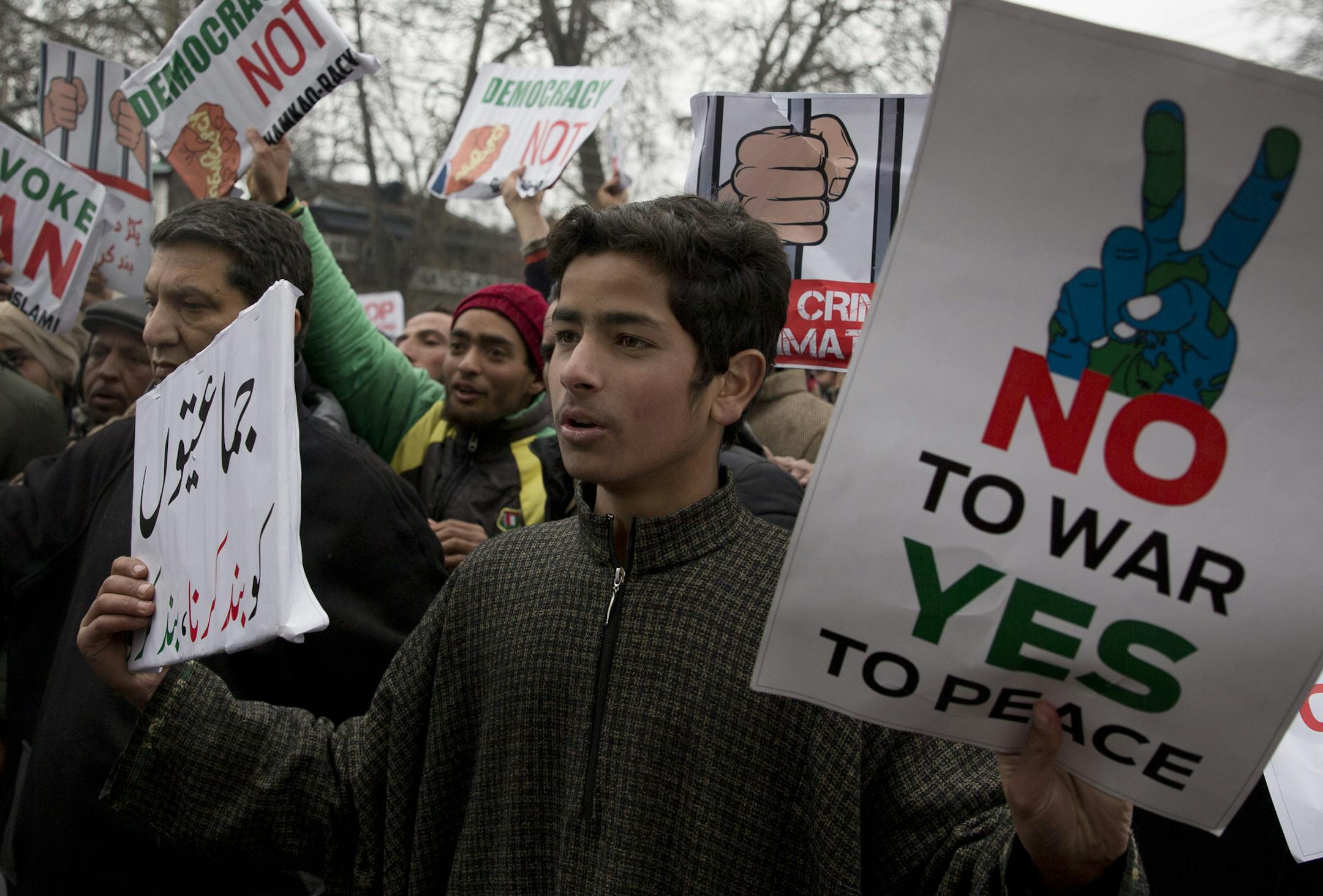 Kashmiri supporters of the Peoples Democratic Party (PDP) shout slogans against banning of Jama'at-e-Islami, the largest political and religious group in Indian-controlled Kashmir, during a protest in Srinagar, Indian controlled Kashmir, Saturday, March 2, 2019. India has banned the group in Kashmir in a sweeping and ongoing crackdown against activists seeking the end of Indian rule in the disputed region amid most serious confrontation between India and Pakistan in two decades. (AP Photo/ Dar Y