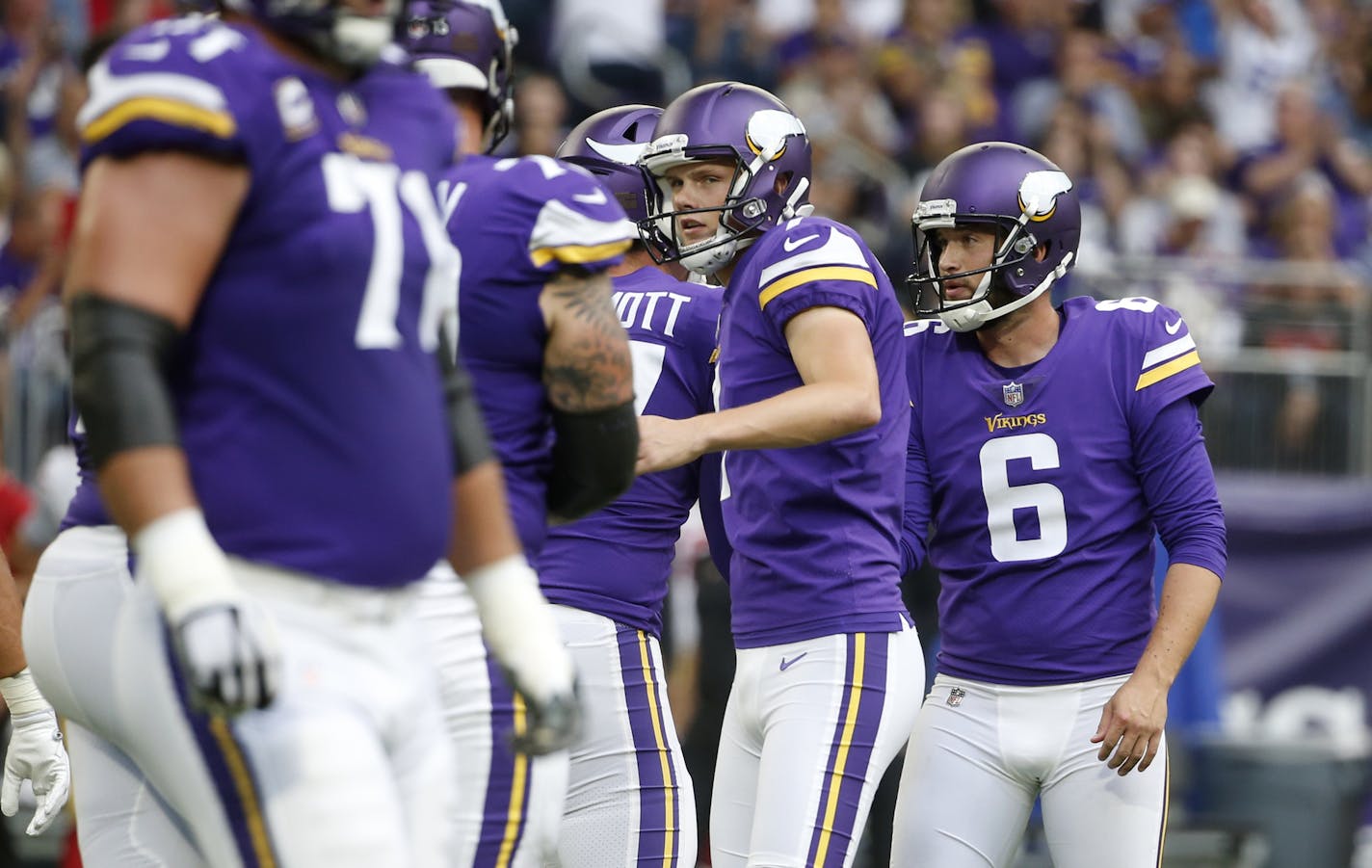 Minnesota Vikings kicker Daniel Carlson, center, celebrates with teammates after kicking a 48-yard field goal during the first half of an NFL football game against the San Francisco 49ers, Sunday, Sept. 9, 2018, in Minneapolis. (AP Photo/Bruce Kluckhohn)