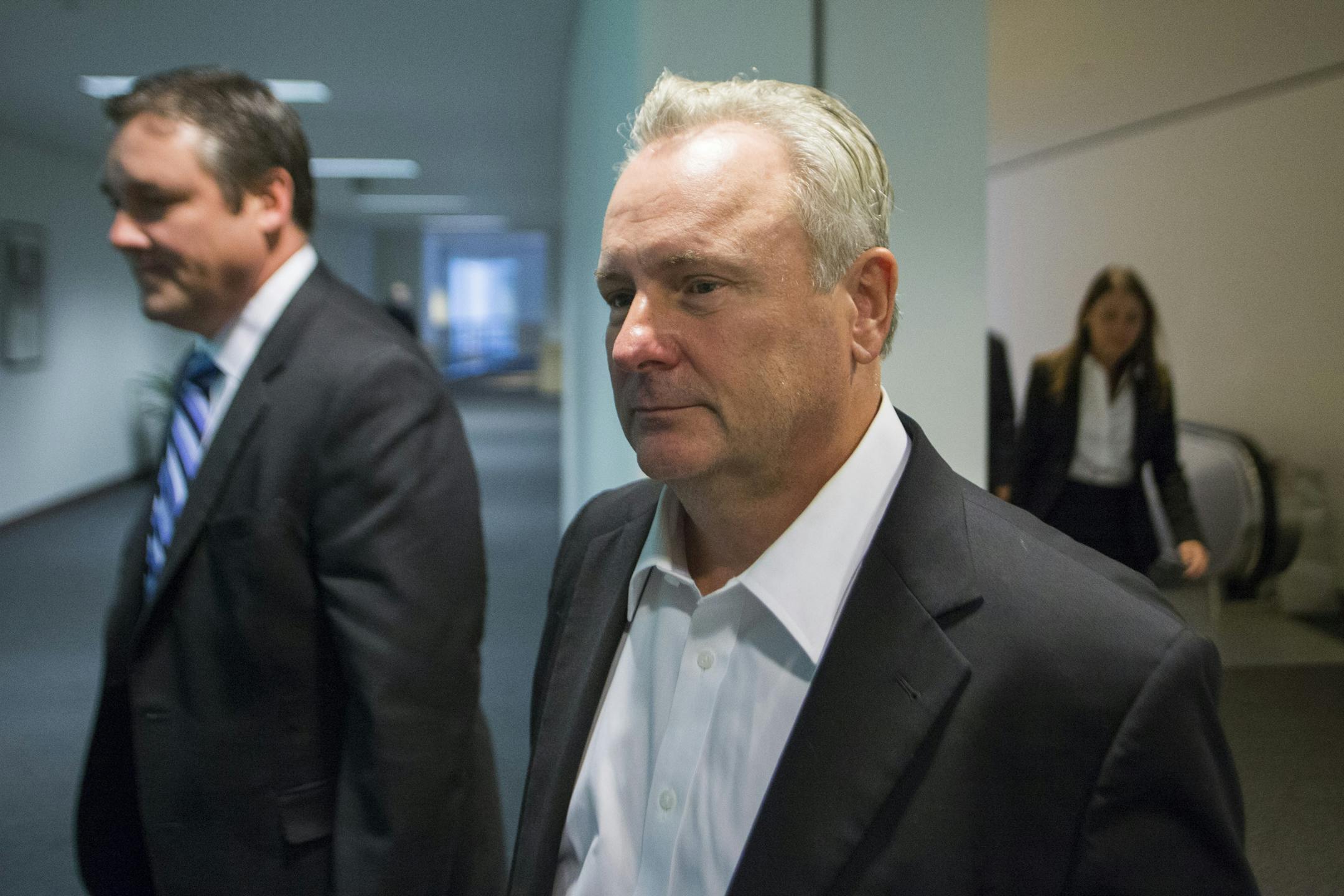 Former Starkey president Jerome C. Ruzicka, right, leaves the Federal Courthouse in 2016. (Mark Vancleave/mark.vancleave@startribune.com)
