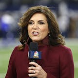 In this Nov. 19, 2017, file photo NBC sideline reporter Michele Tafoya reports before an NFL football game between the Philadelphia Eagles and Dallas Cowboys in Arlington, Texas. Tafoya will work her 250th NFL game as a sideline reported on Sunday night at AT&T Stadium when the Cowboys host the Giants. That's one of the favorite venues for Tafoya, who also has done games for ABC and ESPN and now is with NBC. (AP Photo/Ron Jenkins, File)