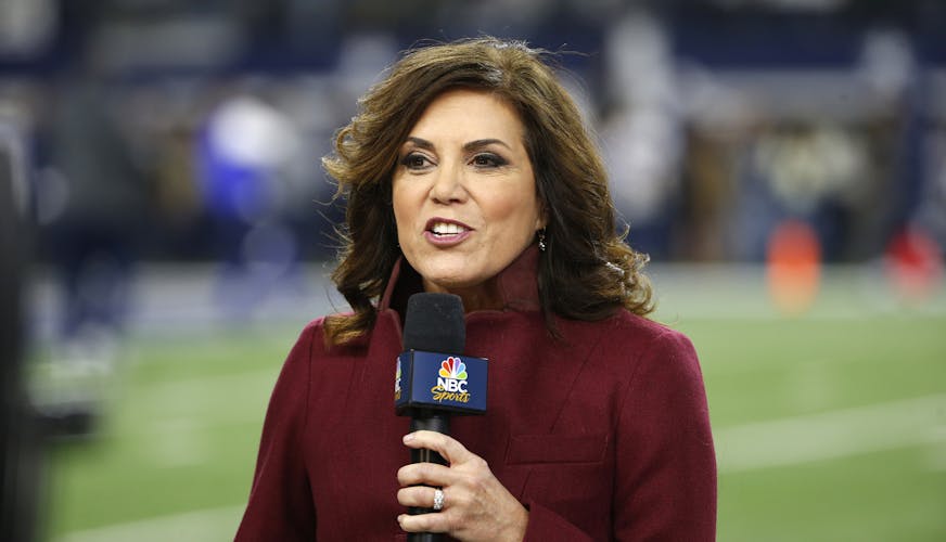 In this Nov. 19, 2017, file photo NBC sideline reporter Michele Tafoya reports before an NFL football game between the Philadelphia Eagles and Dallas Cowboys in Arlington, Texas. Tafoya will work her 250th NFL game as a sideline reported on Sunday night at AT&T Stadium when the Cowboys host the Giants. That's one of the favorite venues for Tafoya, who also has done games for ABC and ESPN and now is with NBC. (AP Photo/Ron Jenkins, File)