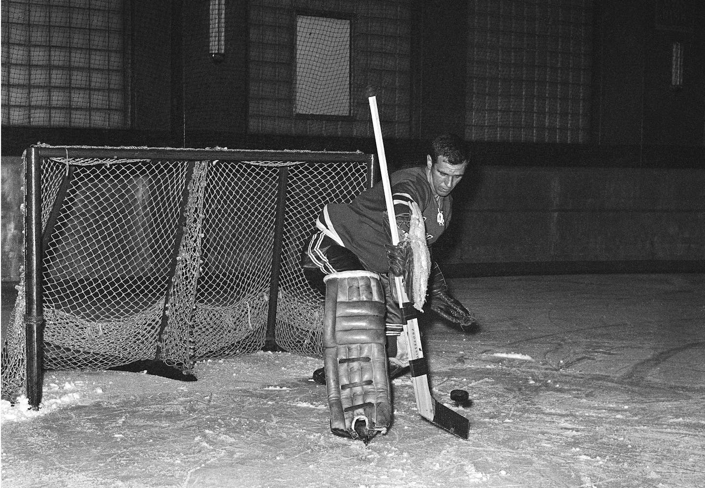 Jack McCartan, 24-year-old goalie who led the United States to its first Olympic hockey gold medal in the Winter games at Squaw Valley, making his debut as net tender for the New York Rangers at Madison Square Garden in New York on March 7, 1960. (AP Photo/Marty Lederhandler)