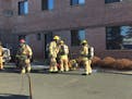 Firefighters work outside the Robbinsdale senior living home that was evacuated Saturday, Nov. 17, 2018.