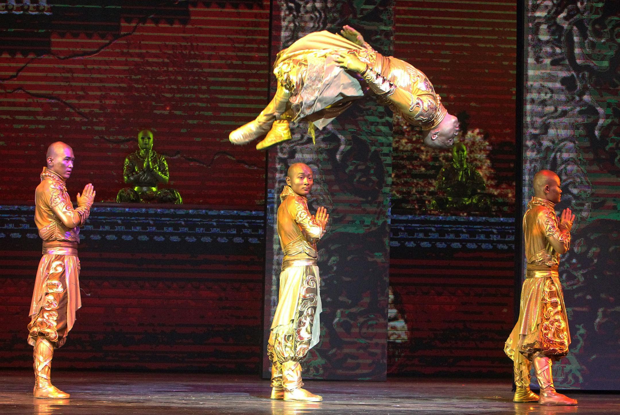 FILE - In this Jan. 3, 2014, file photo, actors perform during a preview of "PANDA!" in the Palazzo Theater at the Palazzo hotel-casino in Las Vegas. ìPANDA!î is the first Chinese-produced show to take up residency on the famous tourist corridor. Directed by An Zhou, the man behind the 2008 Beijing Olympics opening and closing ceremonies, ìPANDA!î opened to mixed critical reviews in December and recently added dates through July. It follows two Chinese-produced resident shows