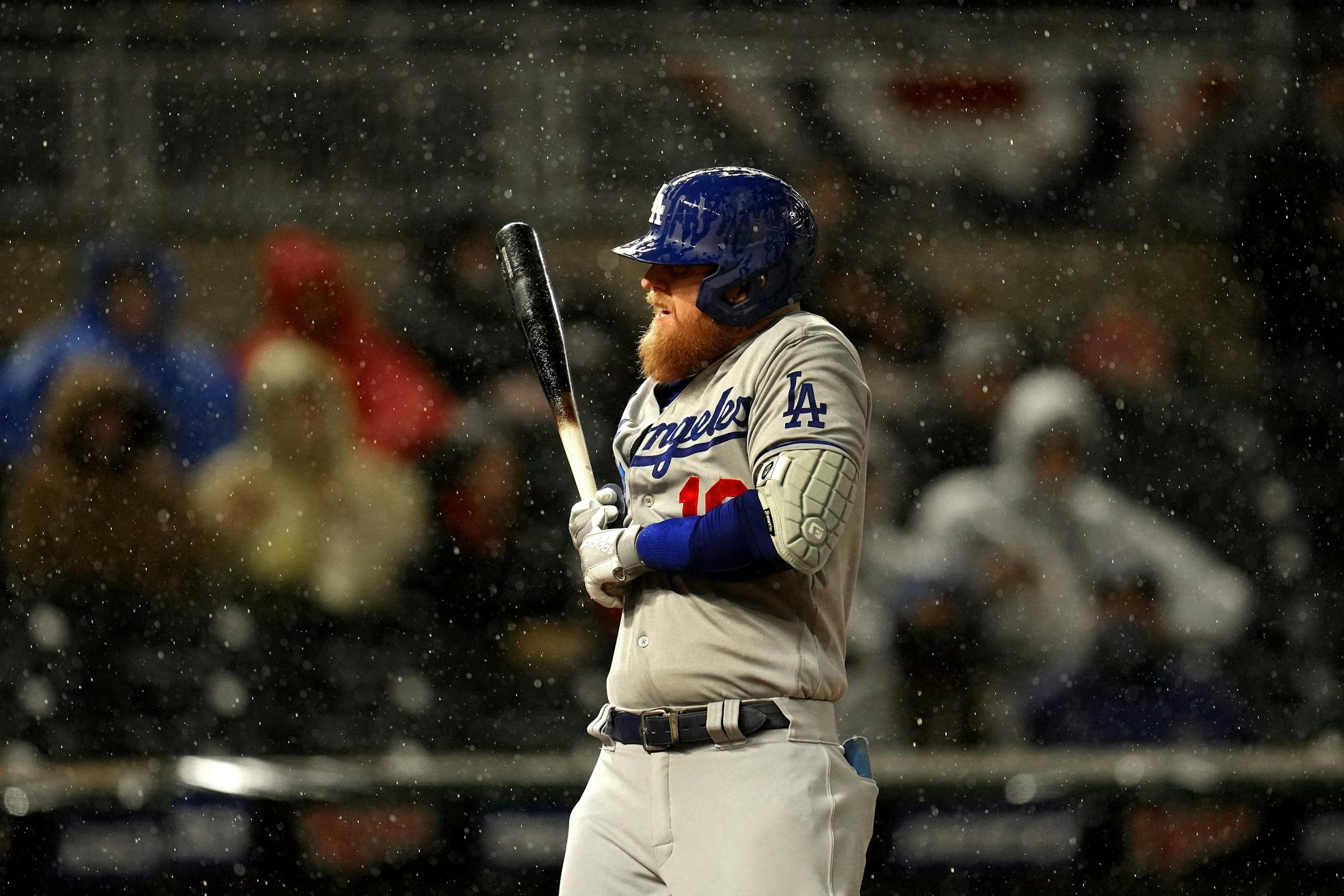 Los Angeles Dodgers third baseman Justin Turner (10) was almost hit by a pitch in in the sixth inning in the heavy rain.