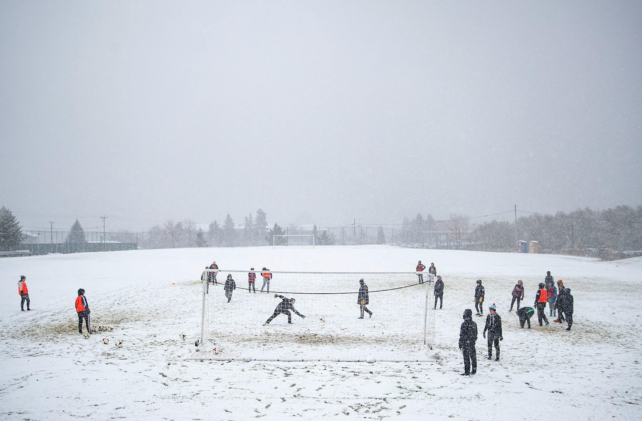 The Marshall School girl's soccer team practiced during an early season snow storm on Tuesday afternoon in Duluth.