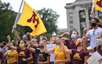 Gophers student athletes sang the Minnesota Rouser after concluding a march and protest against plans by the university to cut four men's sports Wedne