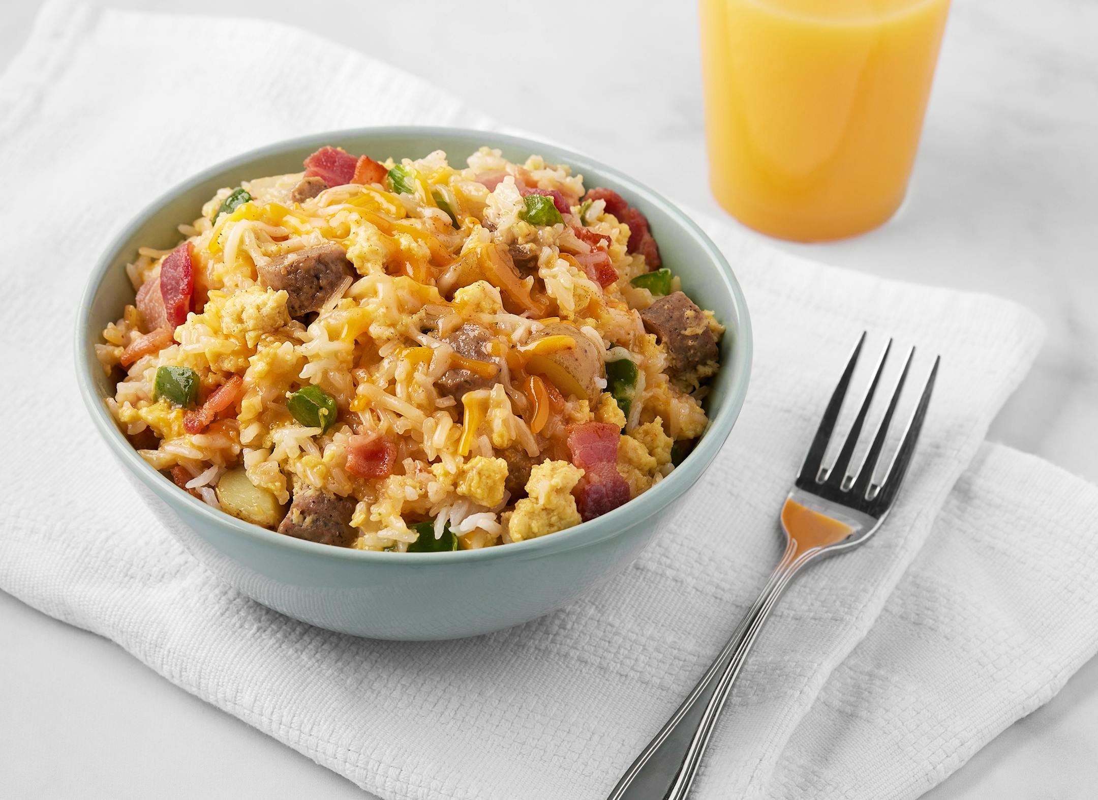 Breakfast Fried Rice, Excerpted from THE SIMPLE COMFORTS STEP-BY-STEP INSTANT POT COOKBOOK by Jeffrey Eisner. Copyright © 2022 by Jeffrey Eisner. Photographs by Aleksey Zozulya. Used with permission of Voracious, an imprint of Little, Brown and Company. New York, NY. All rights reserved.