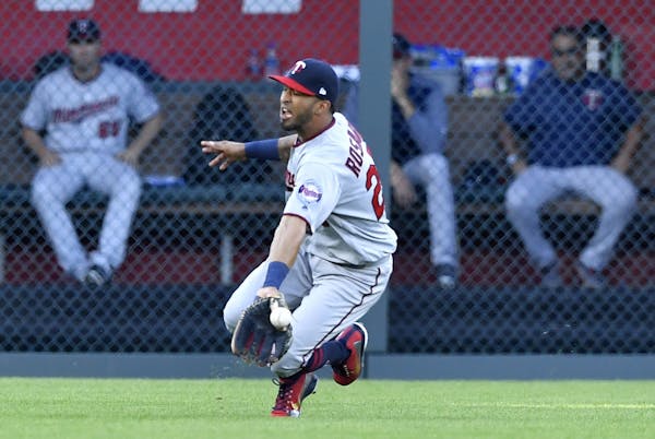 Minnesota Twins left fielder Eddie Rosario couldn't reach a two-run double by the Kansas City Royals' Mike Moustakas in the first inning.
