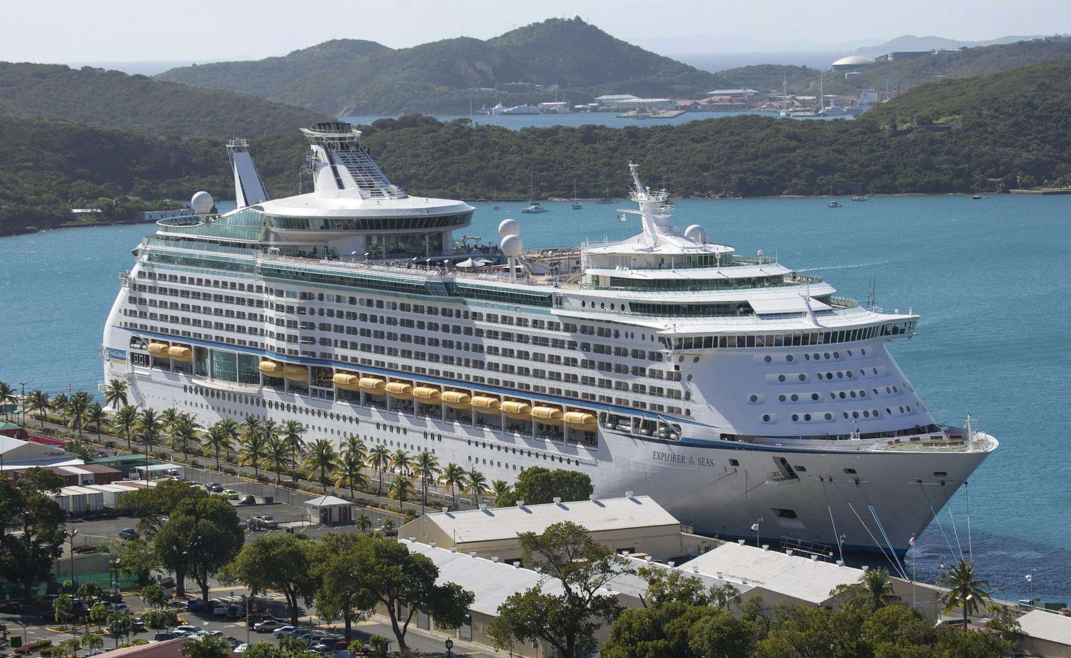 The Royal Caribbean International's Explorer of the Seas is docked at Charlotte Amalie Harbor in St. Thomas, U. S. Virgin Islands, Sunday, Jan. 26, 2014. U.S. health officials have boarded the cruise liner to investigate an illness outbreak that has stricken at least 300 people with gastrointestinal symptoms including vomiting and diarrhea. (AP Photo/Thomas Layer)
