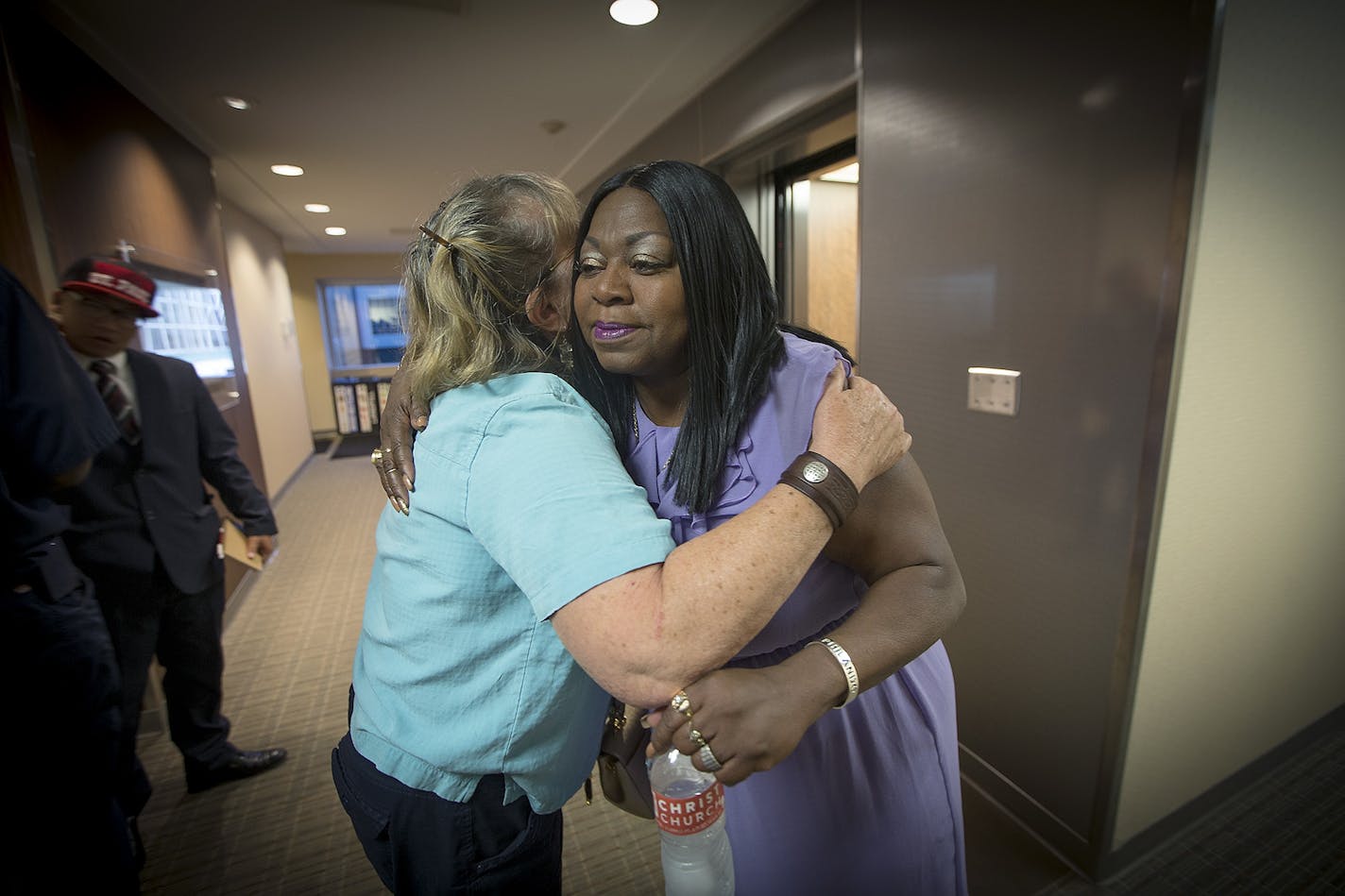 Valerie Castile, mother of Philando Castile was hugged by a supporter after the Board of Peace Officer Standards and Training (POST), voted against a request from Gov. Mark Dayton that a new law enforcement training fund approved by the Legislature this year be named for Philando Castile, Thursday, July 27, 2017 in St. Paul, MN.