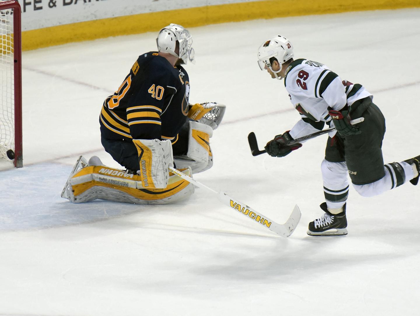 Buffalo Sabres goaltender Robin Lehner (40) gets beat as Minnesota Wild left winger Jason Pominville (29) for the game-winning goal in a shootout during an NHL hockey game, Saturday, March 5, 2016, in Buffalo, N.Y. Minnesota won 3-2 in a shootout. (AP Photo/Gary Wiepert)