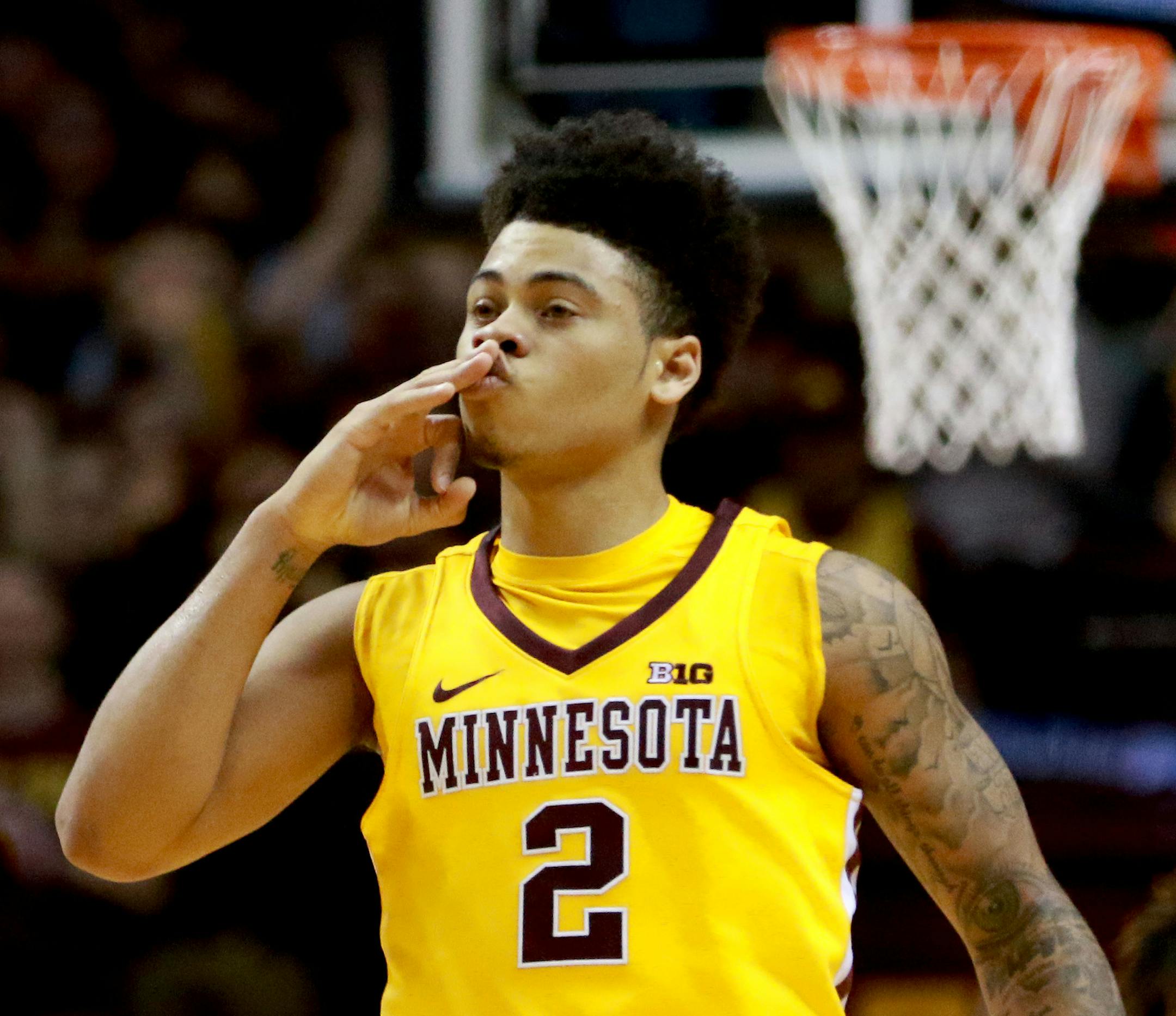 The University of Minnesota's Nate Mason (2) signaled a three and sealed it with a kiss during the Gopher's 81-71 win over Penn State Saturday, Feb. 25, 2017, at Williams Arena in Minneapolis, MN.] DAVID JOLES ï david.joles@startribune.com Gophers vs. Penn State, men's basketball