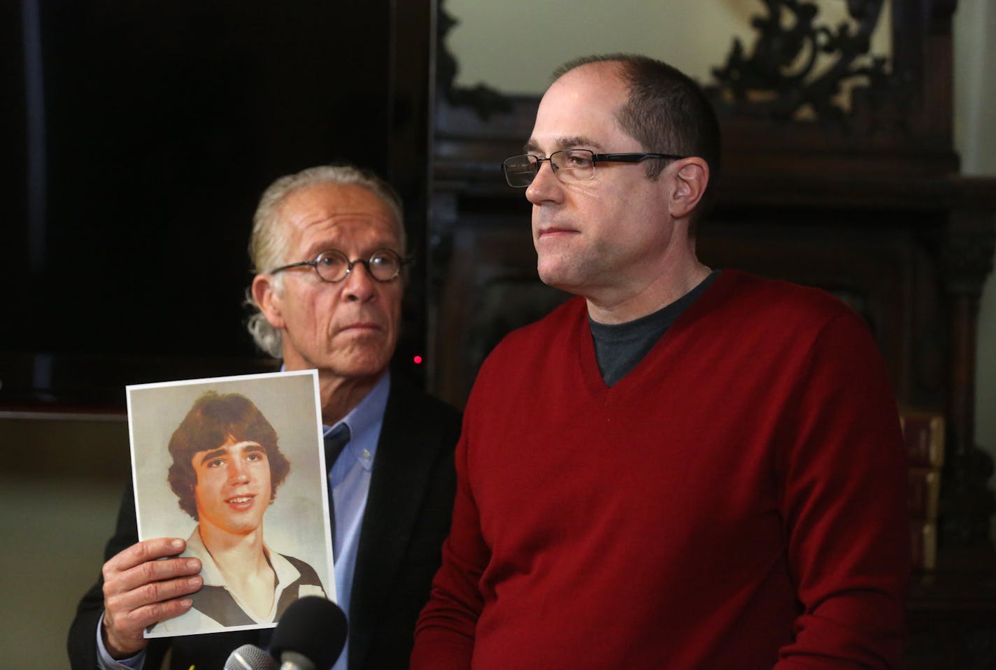 Todd Hildebrandt, 53 (right), appeared at a news conference at the offices of St. Paul attorney Jeff Anderson. Hildebrandt is a former child actor and student of the Children&#xed;s Theatre Company who filed a case against former artistic director John Clark Donahue anonymously but now has come forward to make his name known. Anderson held a photograph of Hildebrandt at 16, a year after he said, that sexual abuse began against him. ] JIM GEHRZ &#xef; james.gehrz@startribune.com / St. Paul, MN /