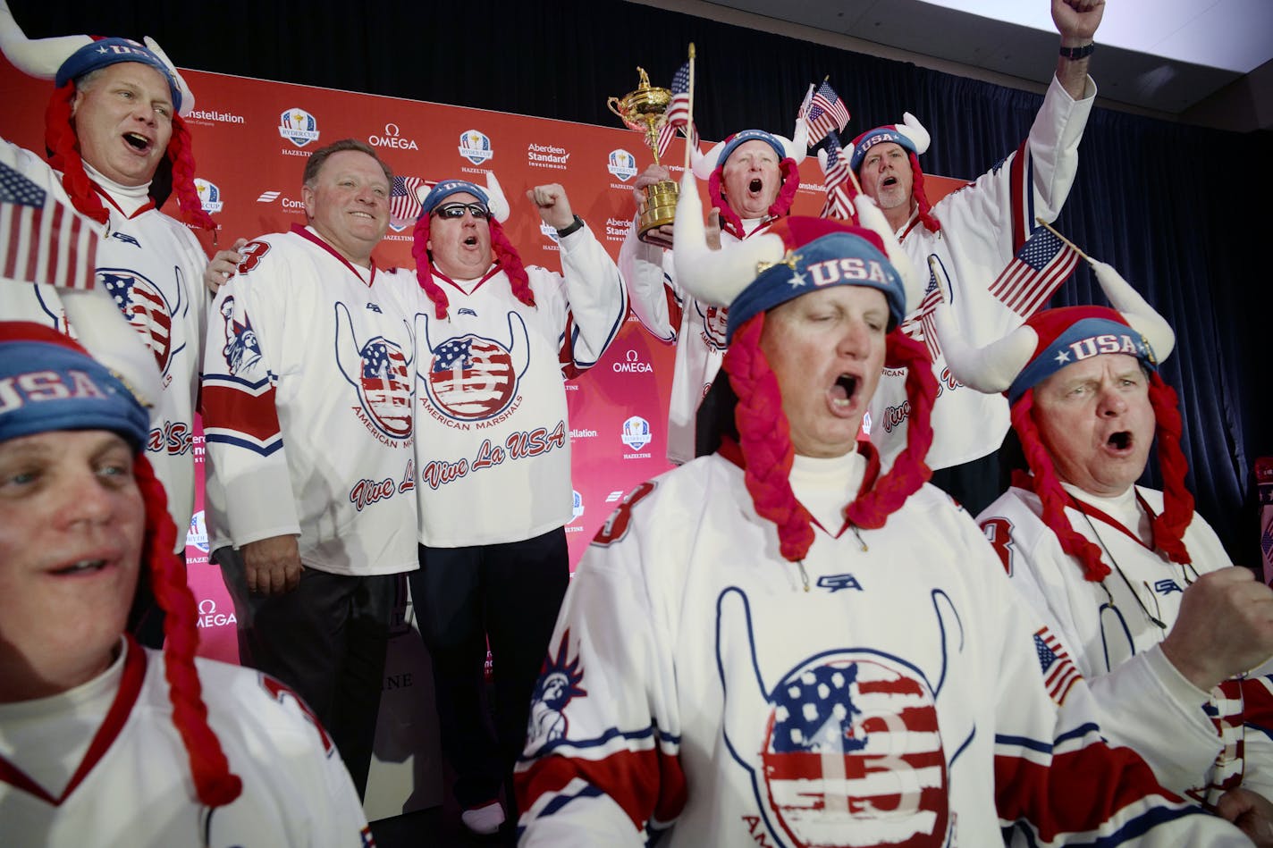 Second from the left in the rear, PGA of America President Paul Levy was given an honorary jersey as he joined the American Marshalls, a group of diehard fans of the Ryder Cup. They got to hold up the trophy at a press conference announcing the return of the tournament to Hazeltine in 2028.