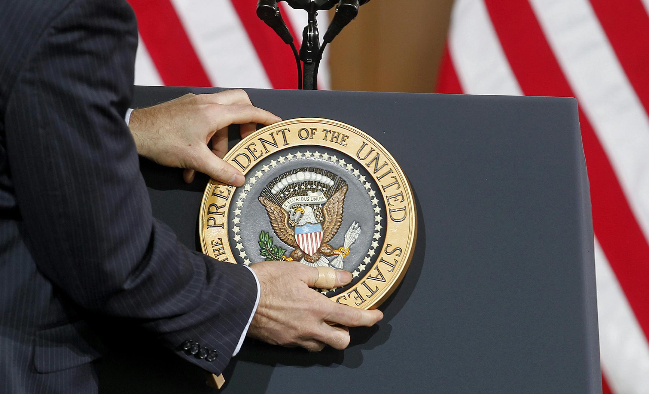 President Barack Obama presidential emblem was placed on the podium before he spoke to a crowd at the Union Depot, Wednesday, February 26, 2014 in St. Paul, MN. (ELIZABETH FLORES/STAR TRIBUNE) ELIZABETH FLORES • eflores@startribune.com ORG XMIT: MIN1402261542180153