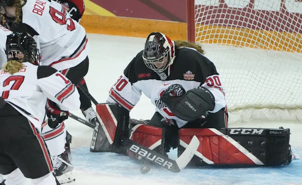 Ohio State goaltender Amanda Thiele makes a save in the first period of Friday's NCAA Women's Frozen Four semifinal game at Amsoil Arena in Duluth