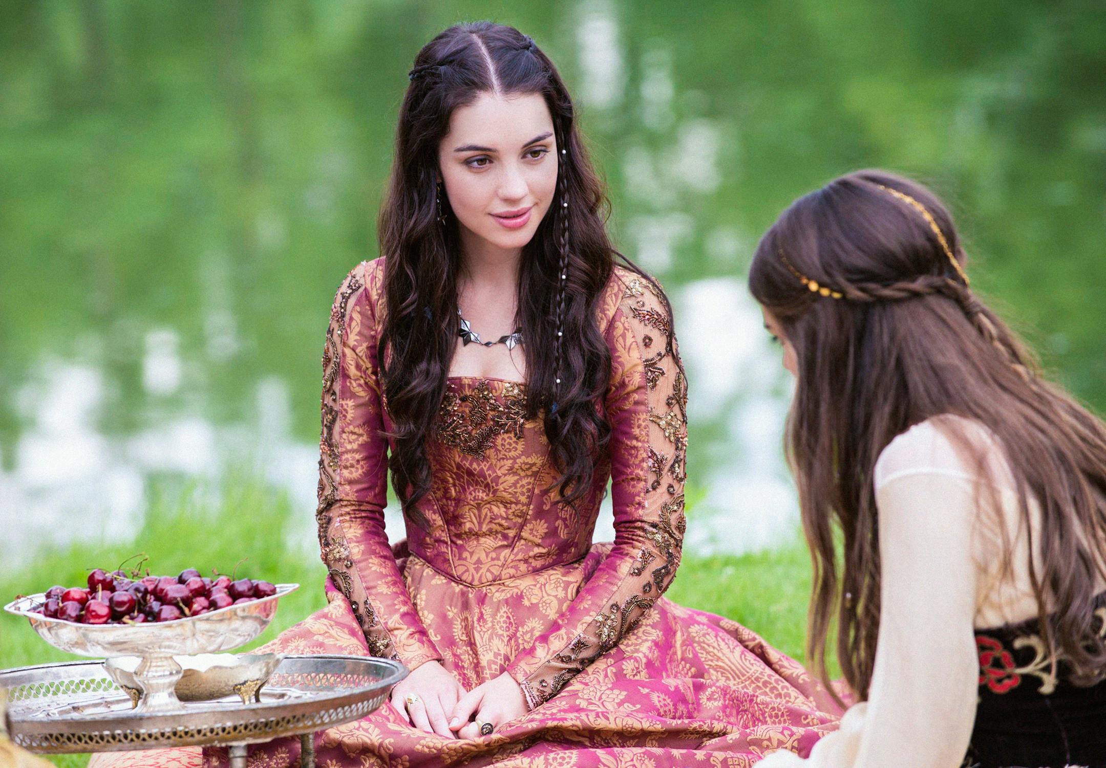 Reign -- √¢ÔøΩÔøΩKisses√¢ÔøΩÔøΩ -- Image Number: RE103a_0111.jpg -- Pictured (L-R): Adelaide Kane as Mary, Queen of Scots and Caitlin Stasey as Kenna (back to camera) -- Photo: Christos Kalohoridis/The CW -- &copy; 2013 The CW Network, LLC. All rights reserved.