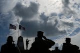 Members of the U.S. joint military service academy choir take part in a ceremony at Utah Beach near Sainte-Marie-du-Mont, Normandy, France, on June 5. This year marked 80 years since the D-Day landings that helped lead to Adolf Hitler's defeat.
