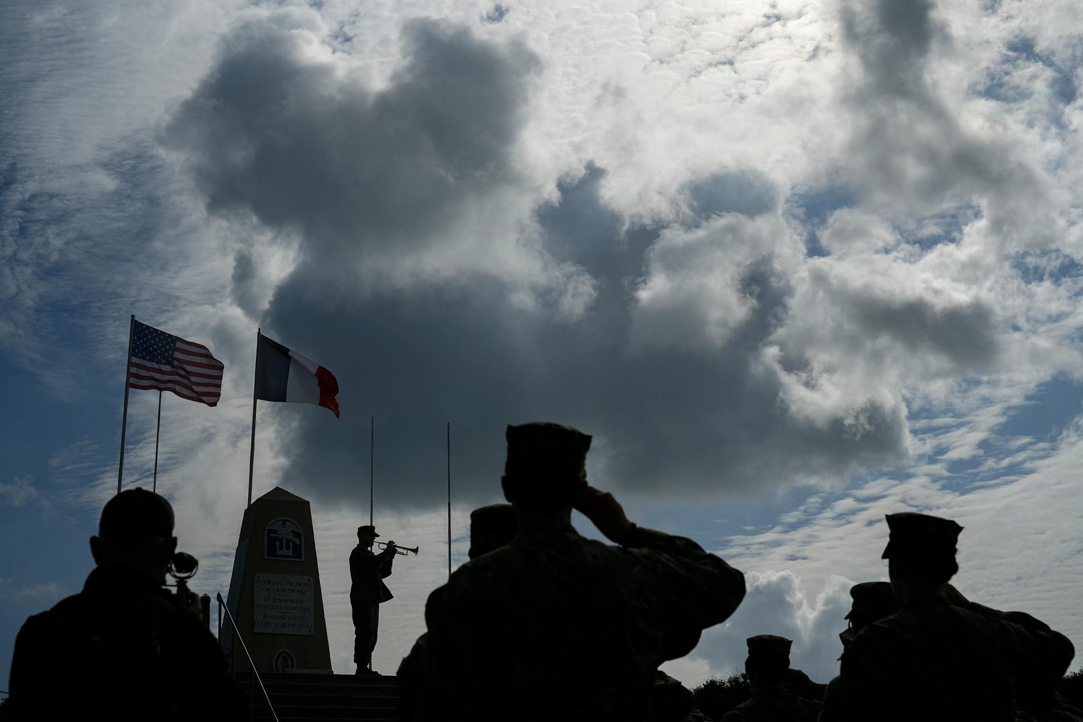 Members of the U.S. joint military service academy choir take part in a ceremony at Utah Beach near Sainte-Marie-du-Mont, Normandy, France, on June 5. This year marked 80 years since the D-Day landings that helped lead to Adolf Hitler's defeat.