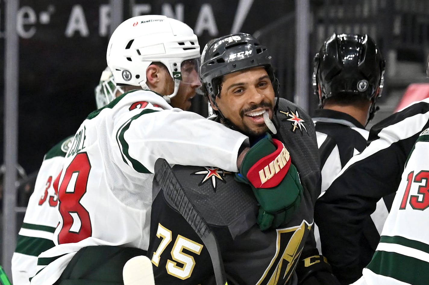 Vegas Golden Knights right wing Ryan Reaves (75) smiles after getting into a scuffle with the Minnesota Wild during the second period of Game 1 of a first-round NHL hockey playoff series Sunday, May 16, 2021, in Las Vegas. (AP Photo/David Becker)