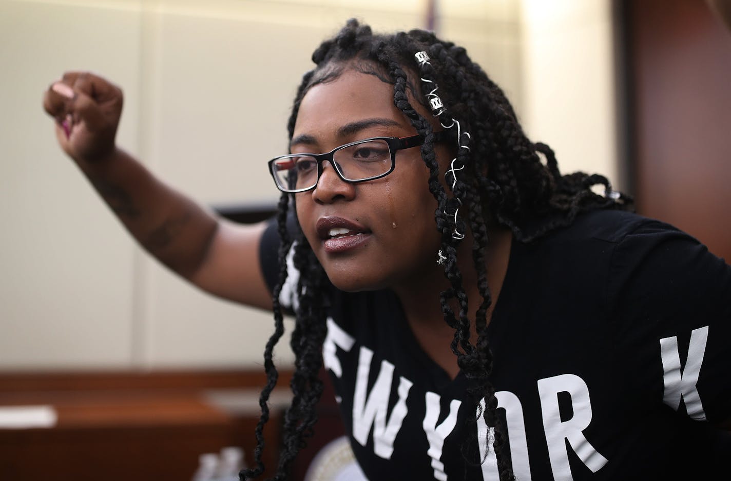 Sydnee Brown a cousin of Thurman Blevins and other protestors, interpreted during press conference held by Hennepin County attorney Mike Freeman at Hennepin County Government Center Monday July 30, 2018 in Minneapolis, MN. ] JERRY HOLT &#xef; jerry.holt@startribune.com