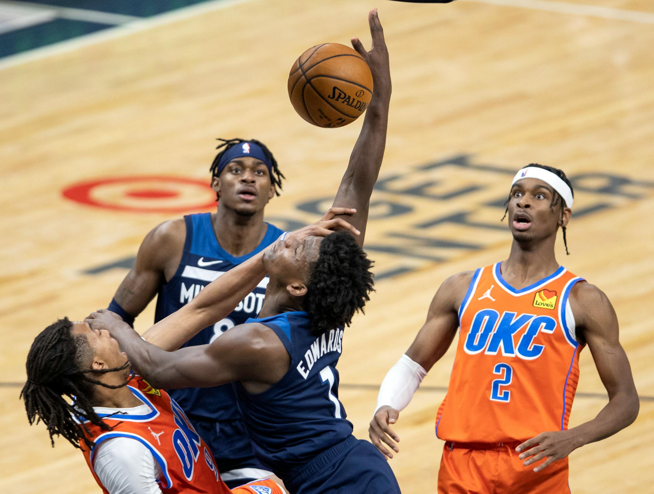 Moses Brown (9) of the Oklahoma City Thunder blocked a shot by Anthony Edwards (1) of the Minnesota Timberwolves in the third quarter.