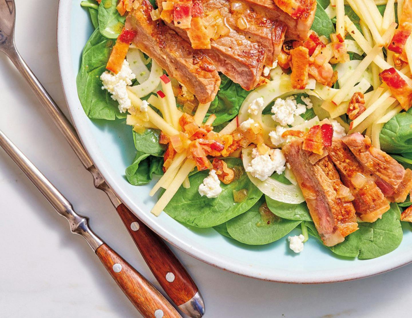 Spinach, Apple and Fennel Salad with Warm Bacon &amp; Shallot Dressing from Beef it Up by Jessica Formicola (Storey 2022) Credit: Dominic Perry