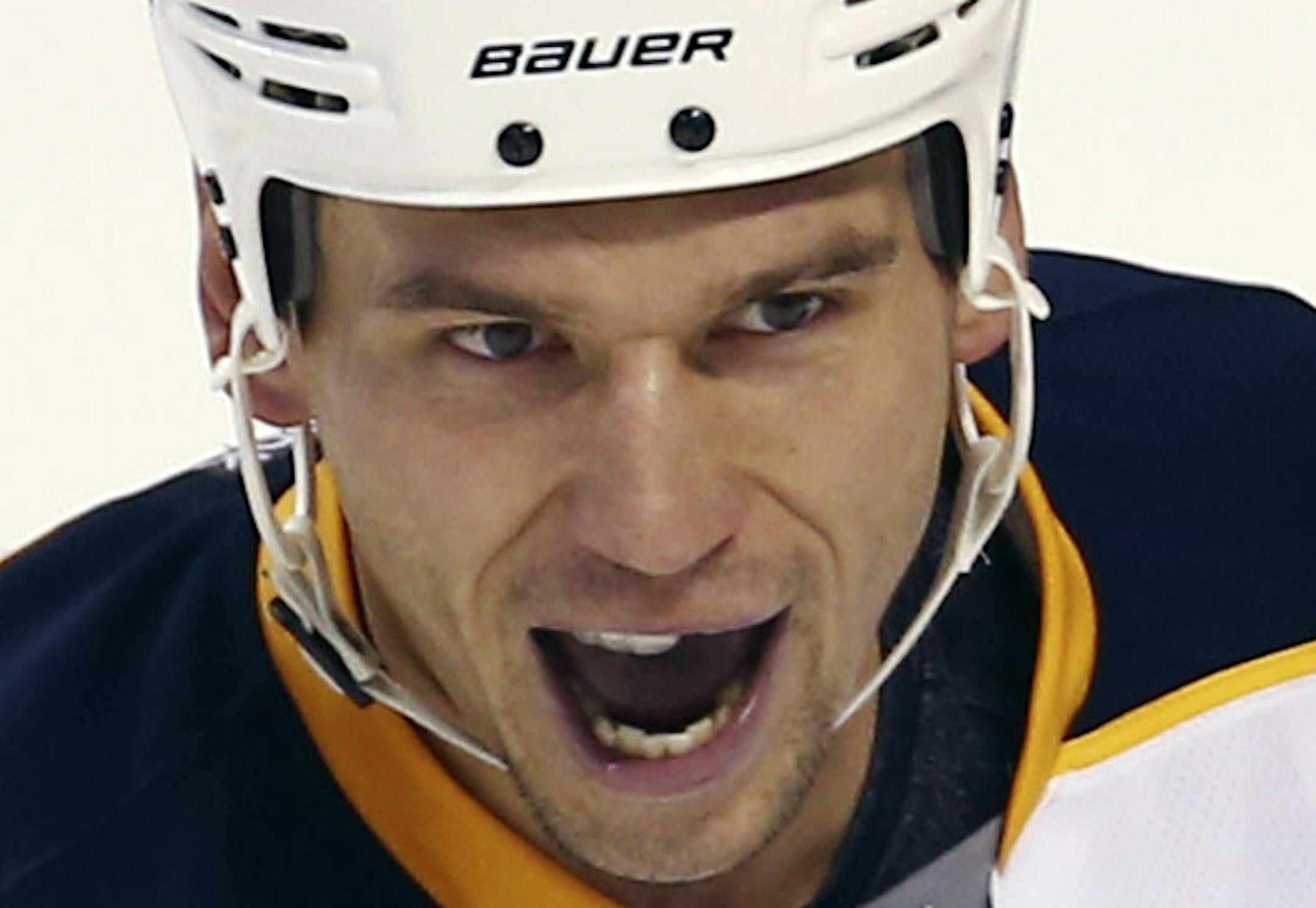 Buffalo Sabres' Cody McCormick (8) celebrates with Cody Hodgson after Hodgson scored a goal during the third period of an NHL hockey game in Sunrise, Fla., against the Florida Panthers, Friday, Oct. 25, 2013. The Sabres won 3-1. (AP Photo/J Pat Carter) ORG XMIT: FLJC113