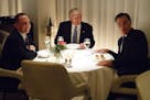 President-elect Donald Trump, center, eats dinner with Mitt Romney, right, and Trump Chief of Staff Reince Priebus at Jean-Georges restaurant, Tuesday