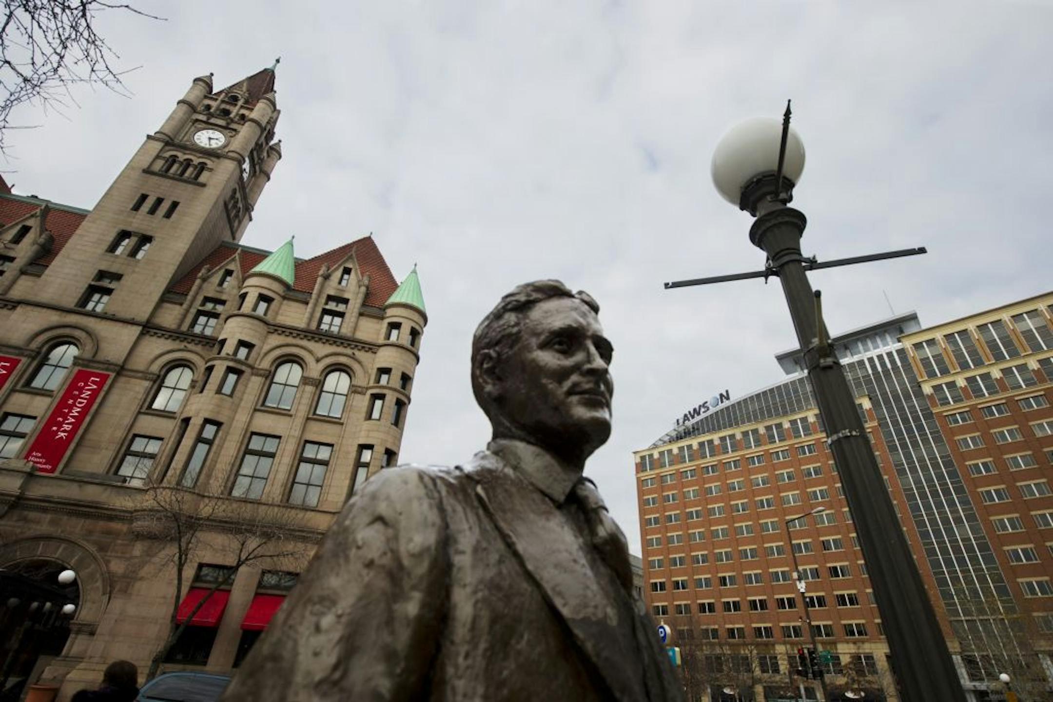 A statue of F. Scott Fitzgerald oversees Rice Park in St. Paul, one of the cities in the state considered especially manufacturer-friendly.