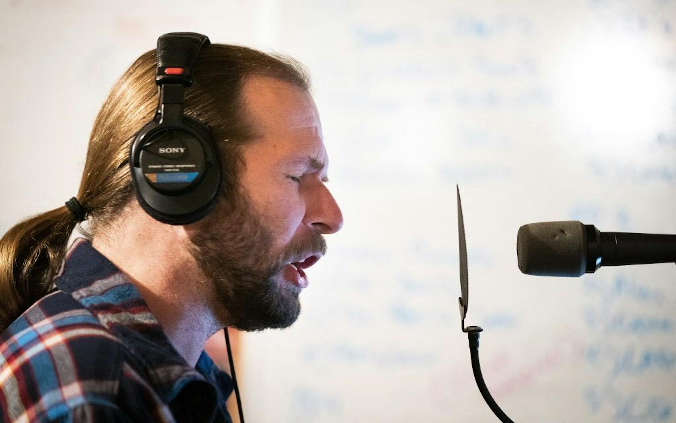 Todd Millenacker works on a demo of a jingle.