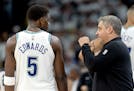 Timberwolves guard Anthony Edwards and assistant coach Micah Nori talk in the fourth quarter of Game 1 of the NBA Western Conference finals against th