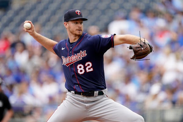 Twins starting pitcher Bailey Ober throws during the first inning against the Kansas City Royals