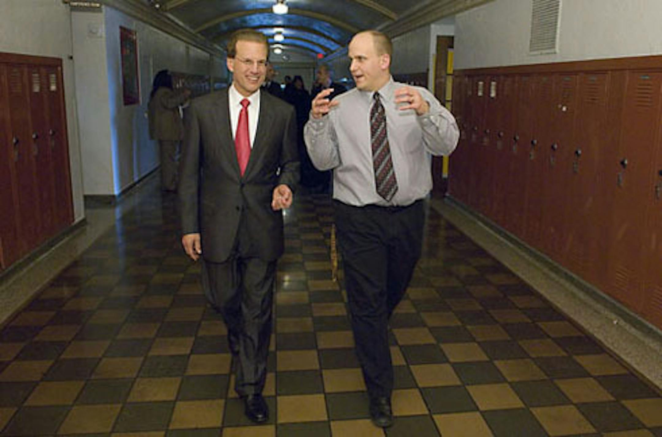 Tom Tusken, right, was named Denfeld High School's principal on Tuesday.