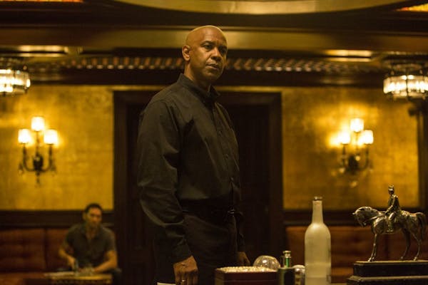 In this image released by Columbia Pictures, Denzel Washington appears in a scene from "The Equalizer."