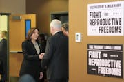 Vice President Kamala Harris greeted Gov. Tim Walz at Planned Parenthood on Thursday in St. Paul.