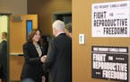 Vice President Kamala Harris greeted Gov. Tim Walz at Planned Parenthood on Thursday in St. Paul.