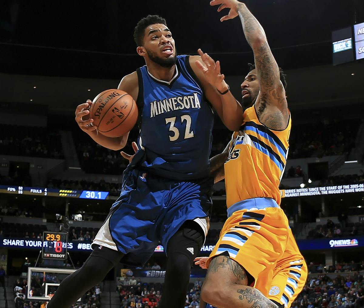 Karl-Anthony Towns, driving on Denver&#x2019;s Wilson Chandler on Wednesday, was a playmaker for much of the game before scoring 11 fourth-quarter poi