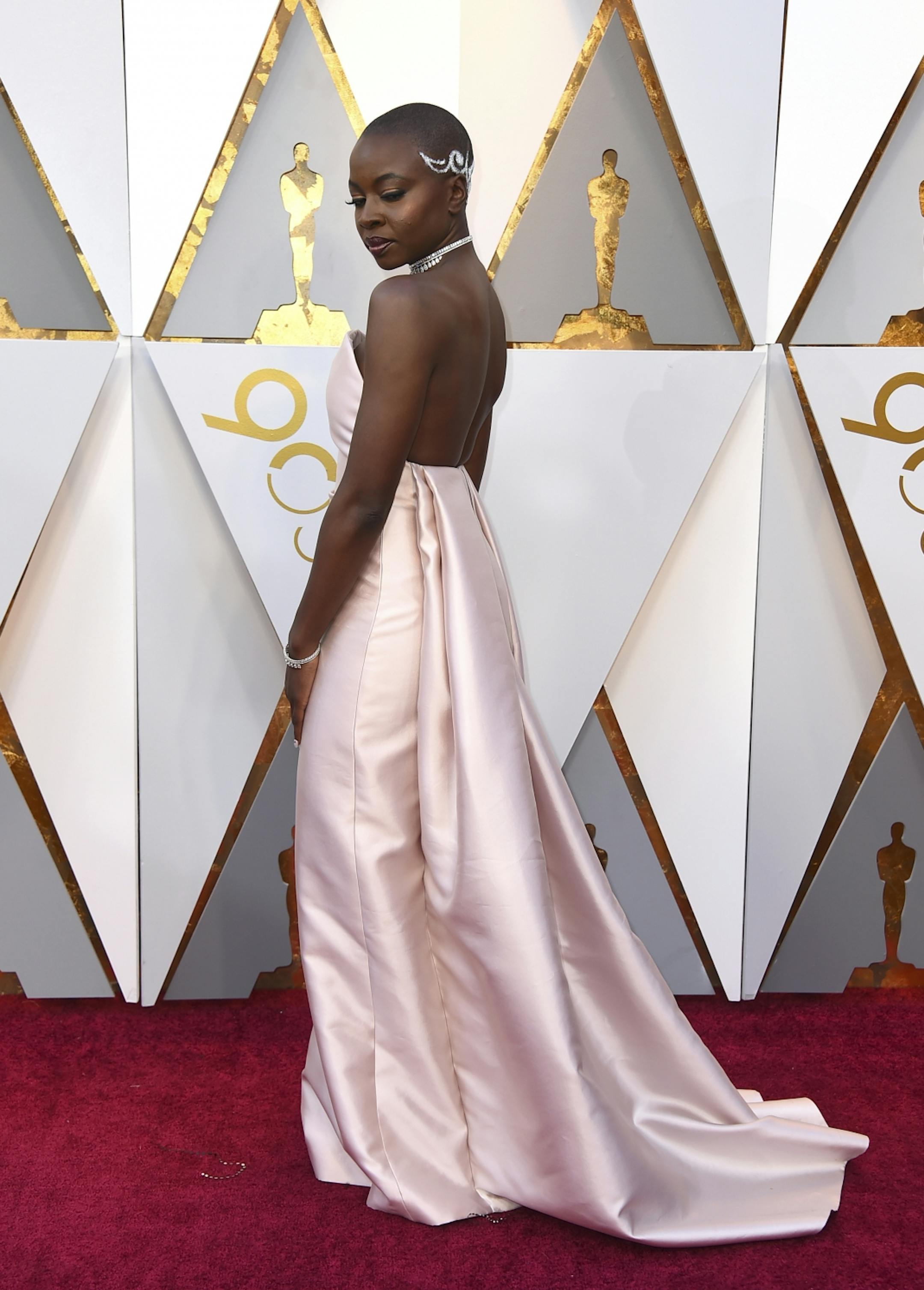 Danai Gurira arrives at the Oscars on Sunday, March 4, 2018, at the Dolby Theatre in Los Angeles.