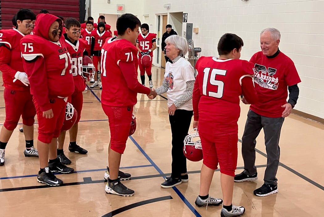 Tom and Meredith Olson met with the Warriors football team while visiting Red Lake recently.