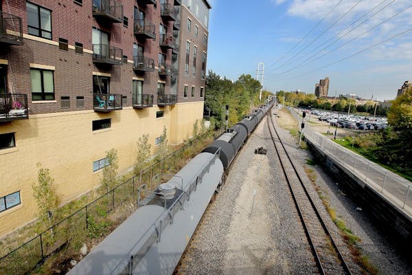 A train made its way along the tracks near downtown Minneapolis on Tuesday. The number of trains carrying oil from North Dakota and traveling through 