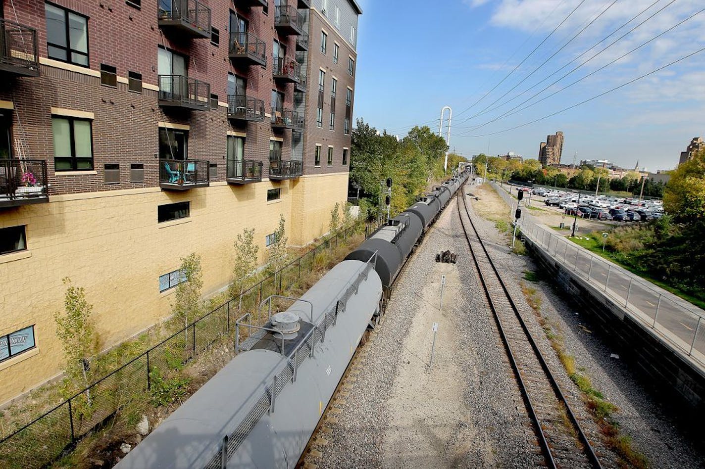 A train made its way along the tracks near downtown Minneapolis on Tuesday. The number of trains carrying oil from North Dakota and traveling through the west metro and downtown Minneapolis has temporarily been increased.