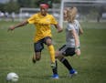 Monrovia Football Academy's Jessica Quachie drove the ball down the field for a goal as they took on Eclipse Select MN Regional during the USA Cup tou