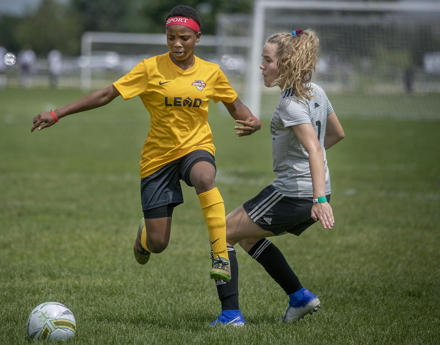 Monrovia Football Academy's Jessica Quachie drove the ball down the field for a goal as they took on Eclipse Select MN Regional during the USA Cup tournament, Tuesday, July 16, 2019 at the National Sports Center in Blaine, MN. The youth soccer team from Liberia traveled to Minnesota for its first trip to the States, to play in the mega-tourney and were supported by the local Liberian community. Monrovia defeated Minnesota 9-1. ] ELIZABETH FLORES • liz.flores@startribune.com