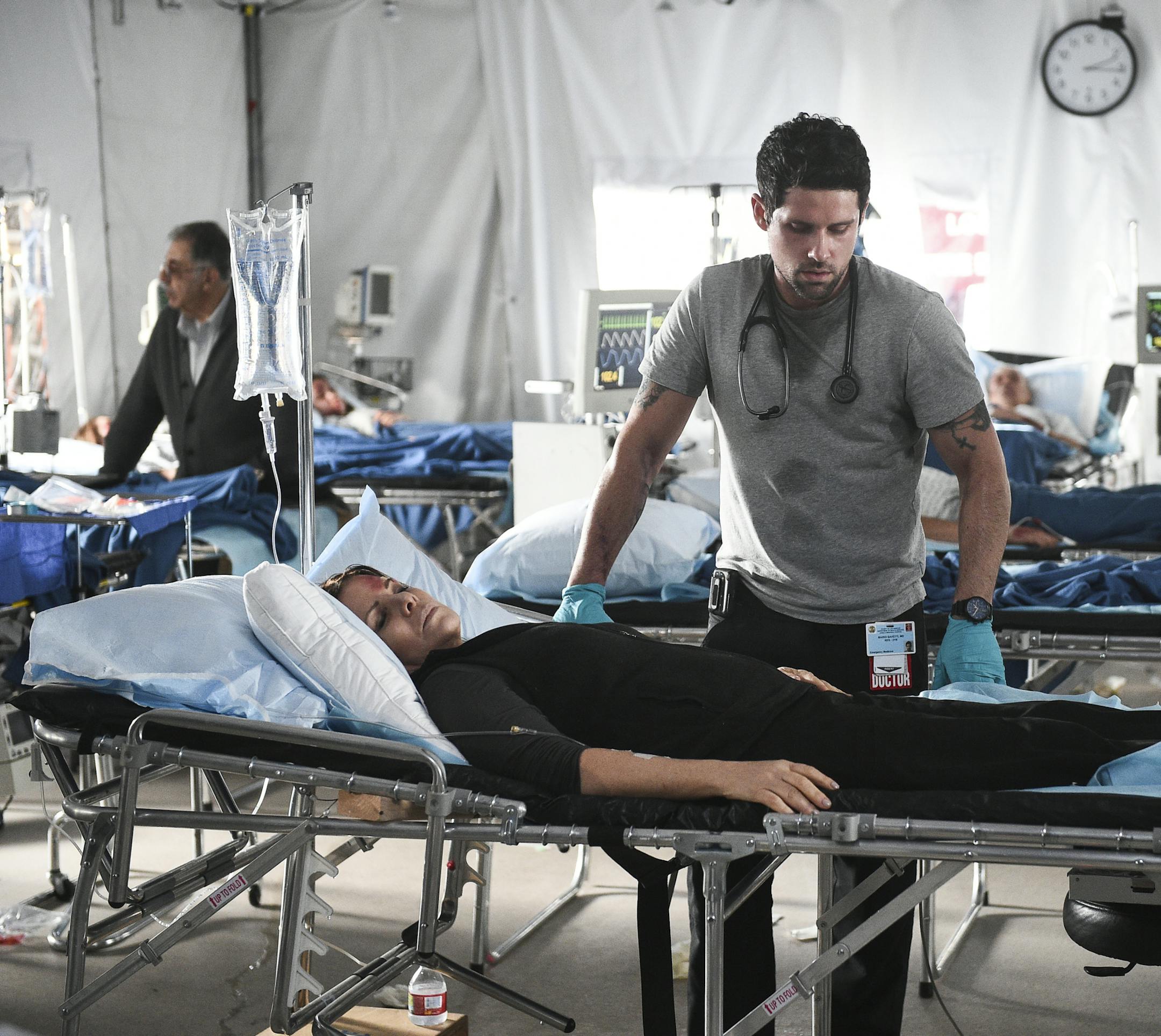 "Fallen Angels" -- The doctors work with the Center for Disease Control and Prevention to find an antidote to the deadly viral outbreak at Angels Memorial. Also, Leanne makes a life-changing decision, and Jesse welcomes a new batch of residents, on the second season finale of CODE BLACK, Wednesday, Feb. 8 (10:00-11:00 PM, ET/PT) on the CBS Television Network. Pictured: Marcia Gay Harden (Dr. Leanne Rorish), Benjamin Hollingsworth (Dr. Mario Savetti) Photo: Ron P. Jaffe/CBS √?¬©2