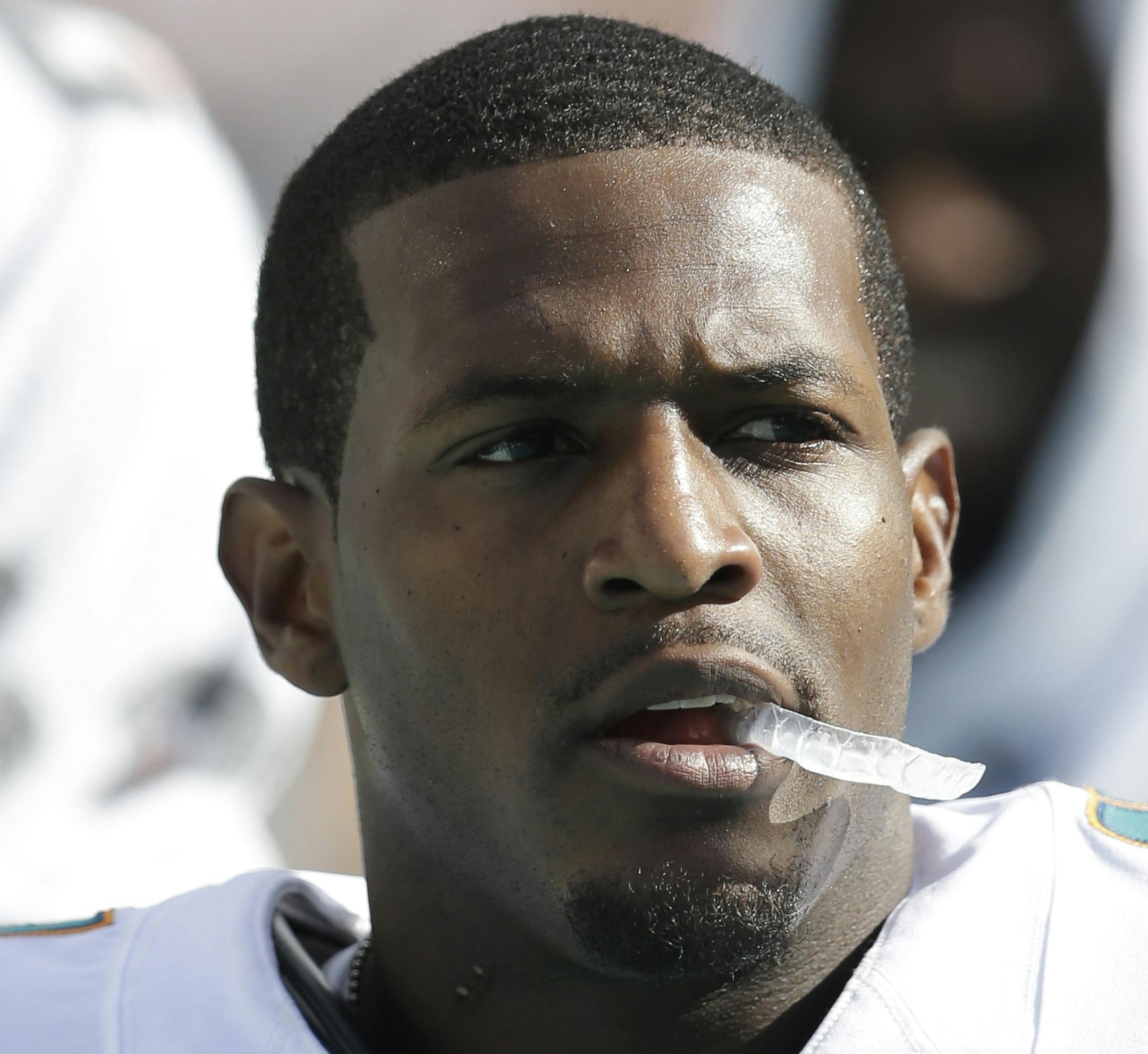 Miami Dolphins wide receiver Mike Wallace (11) walks the sidelines during the first half of an NFL football game against the New York Jets, Sunday, Dec. 28, 2014, in Miami Gardens, Fla. (AP Photo/Wilfredo Lee) ORG XMIT: OTK