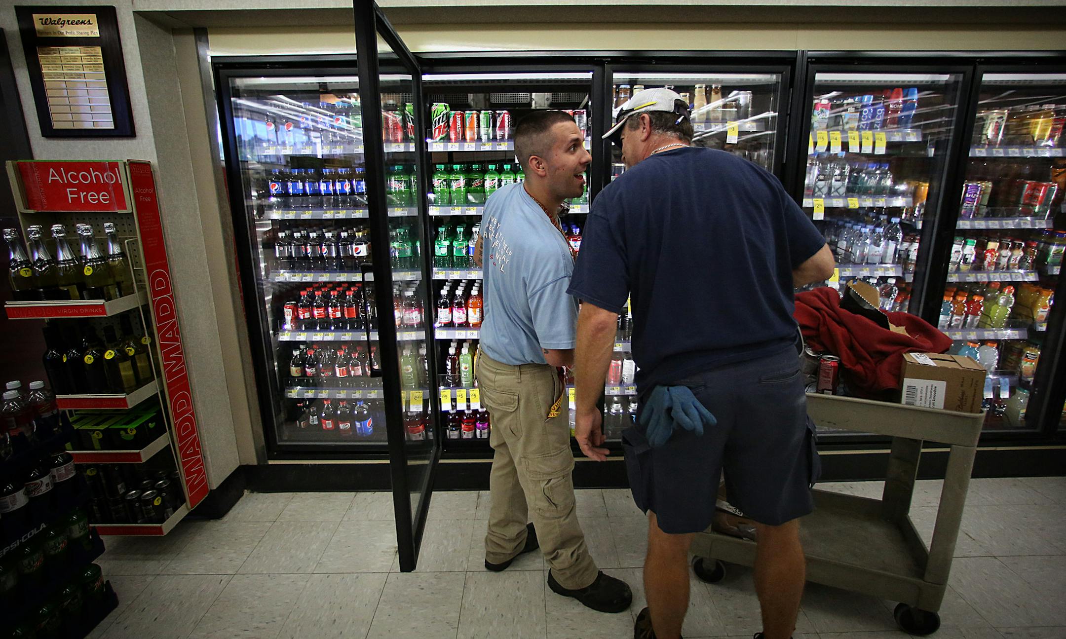 Kyle Anderson, a Marine wounded in Iraq in 2004, spent years recovering at the Minneapolis VA Medical Center. He now maintains the cooler at a Walgreens drugstore in Inver Grove Heights.