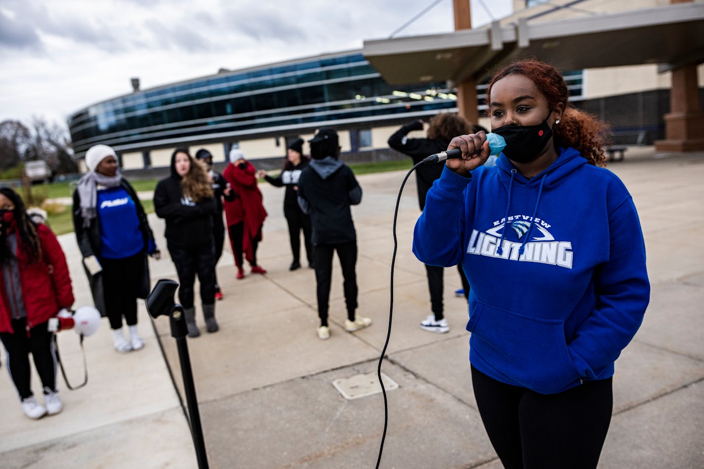 Sarah Abraham, 16, travels to the campus to recount her own experience being discriminated at Apple Valley's Eastview H.S. and previously at Burnsville's Metcalf Middle School, in Prior Lake, Minn., on Thursday, Nov. 11, 2021. Protesters gather to voice their opposition to a allegedly racist video that emerged from an student at Prior Lake H.S. ] RICHARD TSONG-TAATARII • richard.tsong-taatarii@startribune.com