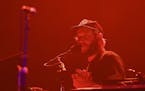 Justin Vernon spoke to the audience Saturday night during the PEOPLE Mix Tape set on the Lake Eaux Lune stage. ] AARON LAVINSKY &#xef; aaron.lavinsky@
